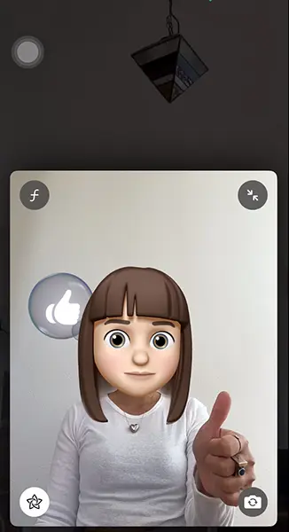 iOS 17を搭載したiPhone「FaceTime」でリアクションジェスチャーが表示される画面