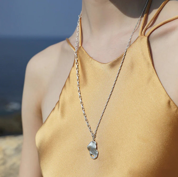 「TEN.」の「puddle necklace（SV）」