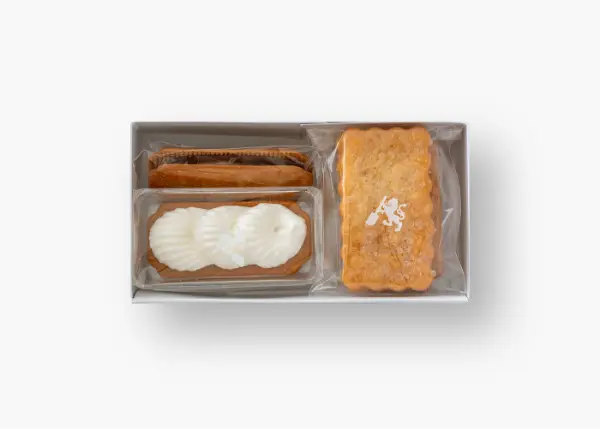 バターブランド「カノーブル」から誕生したドライケーキ専門ブランド「女王製菓」のひと口サイズの「プチドライケーキ」全6種類を詰め合わせたアソートボックス