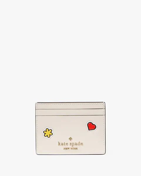 ファッションブランド「kate spade new york（ケイト・スペード ニューヨーク）」の「HELLO KITTY x kate spade new york small slim card holder」