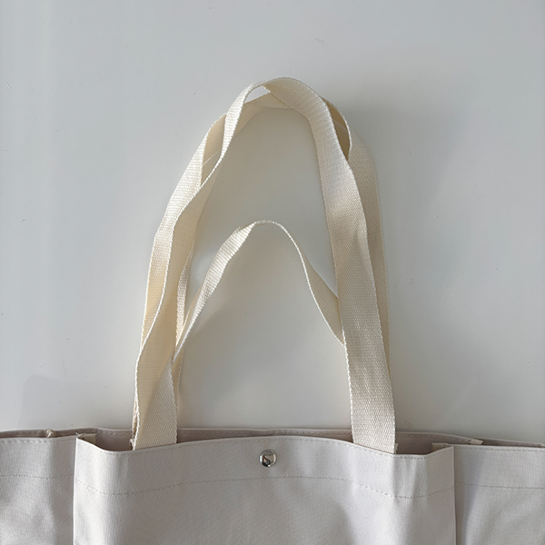 「Café Kitsuné SPECIAL BOOK 2WAY TOTE BAG」のトートバッグの持ち手